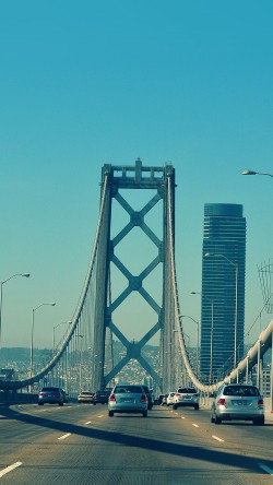 na13-city-bridge-river-building-day-blue