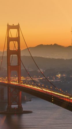 ne11-bridge-orange-sunset-river-city-lights-flare