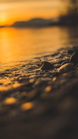 nk56-sea-stone-lake-rock-bokeh-night-wave-orange