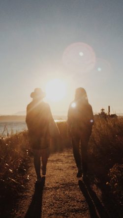 nz46-couple-walking-sunset-nature